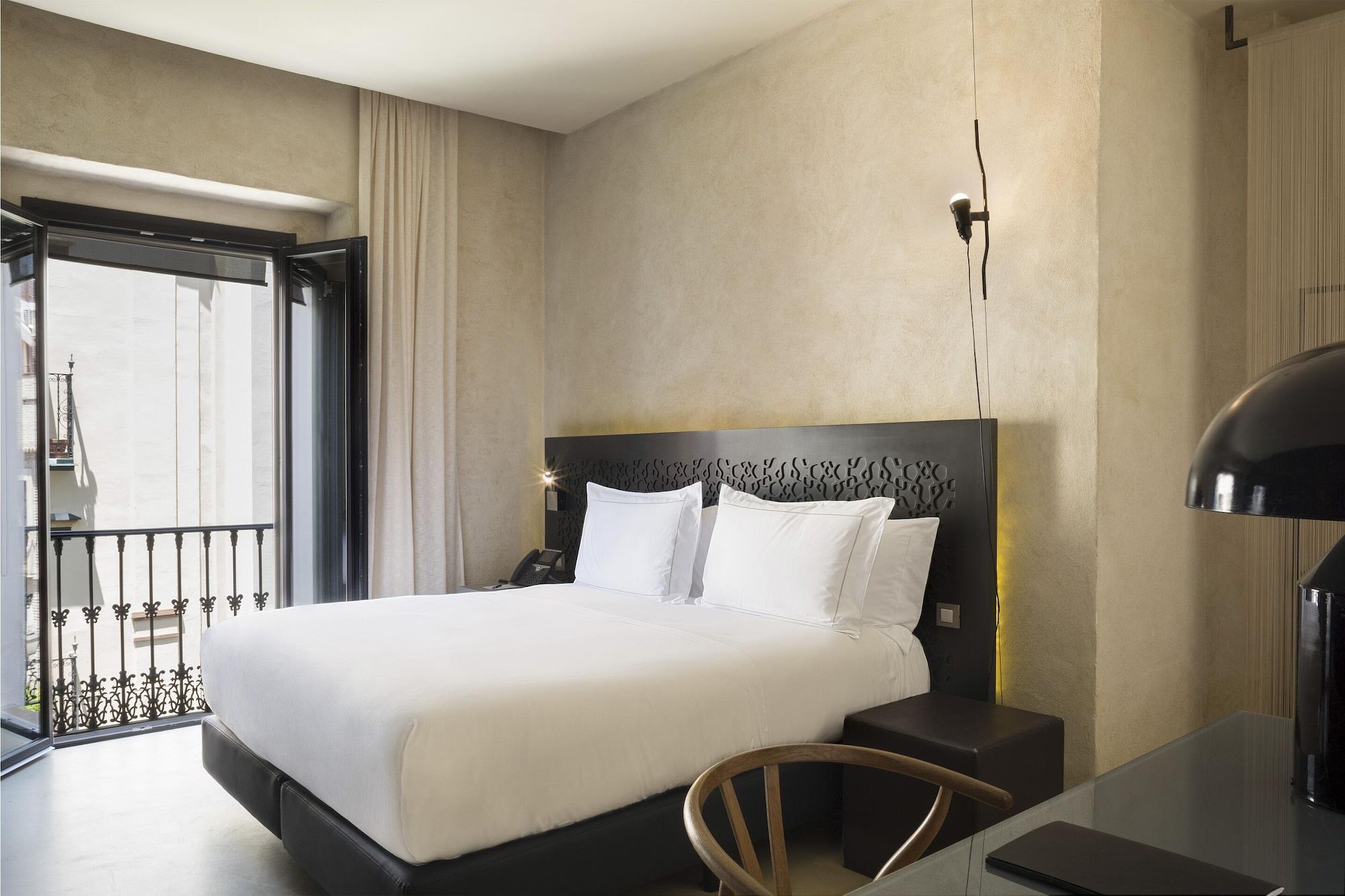סביליה Eme Catedral Mercer Hotel מראה חיצוני תמונה A room at the hotel