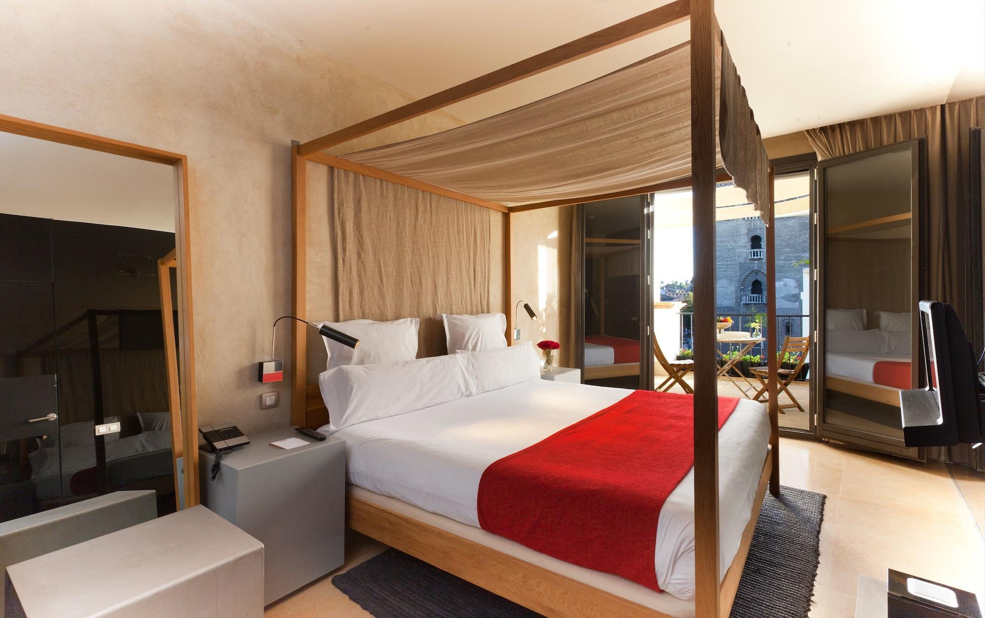 סביליה Eme Catedral Mercer Hotel מראה חיצוני תמונה A bedroom at the hotel