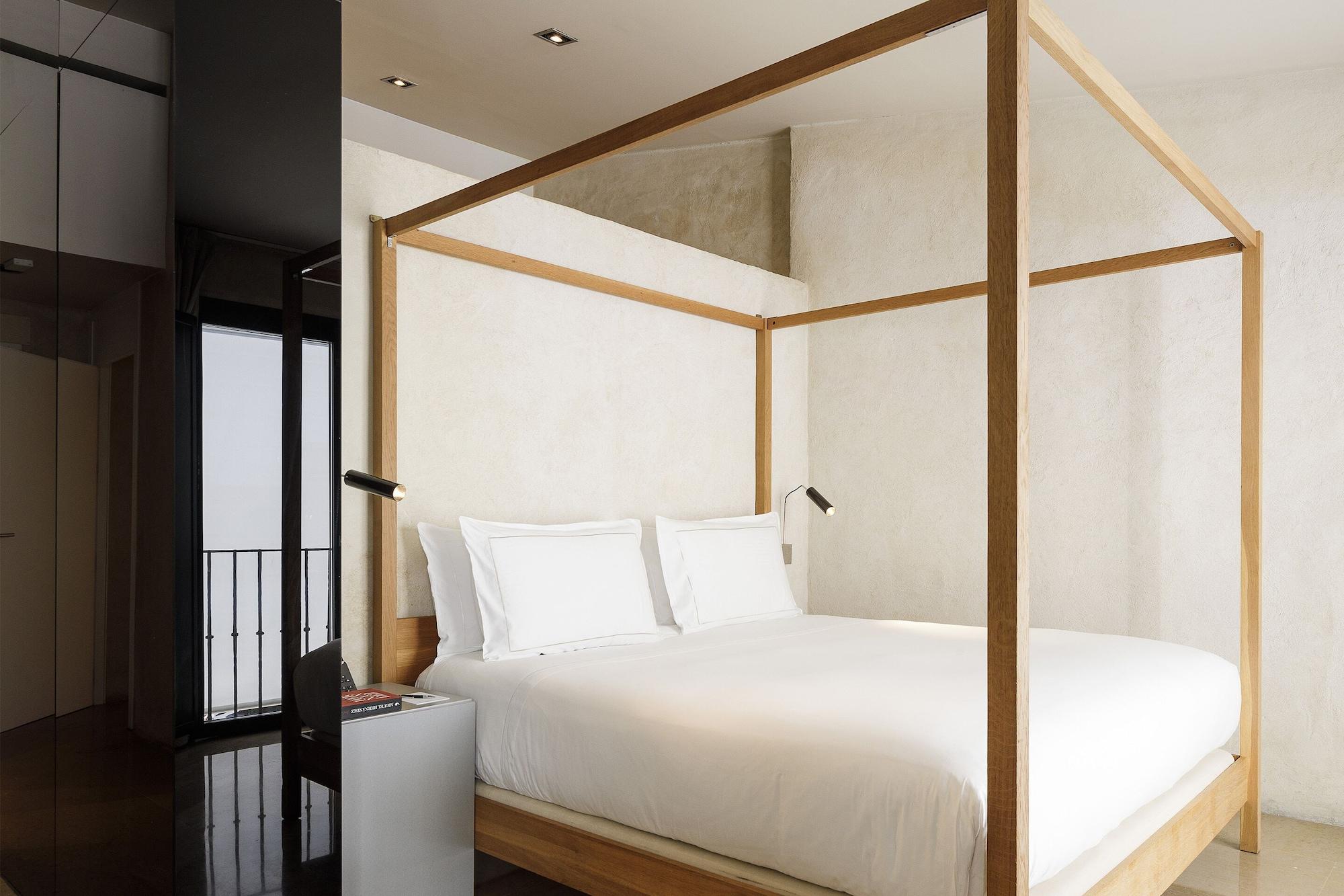סביליה Eme Catedral Mercer Hotel מראה חיצוני תמונה A bedroom at the hotel