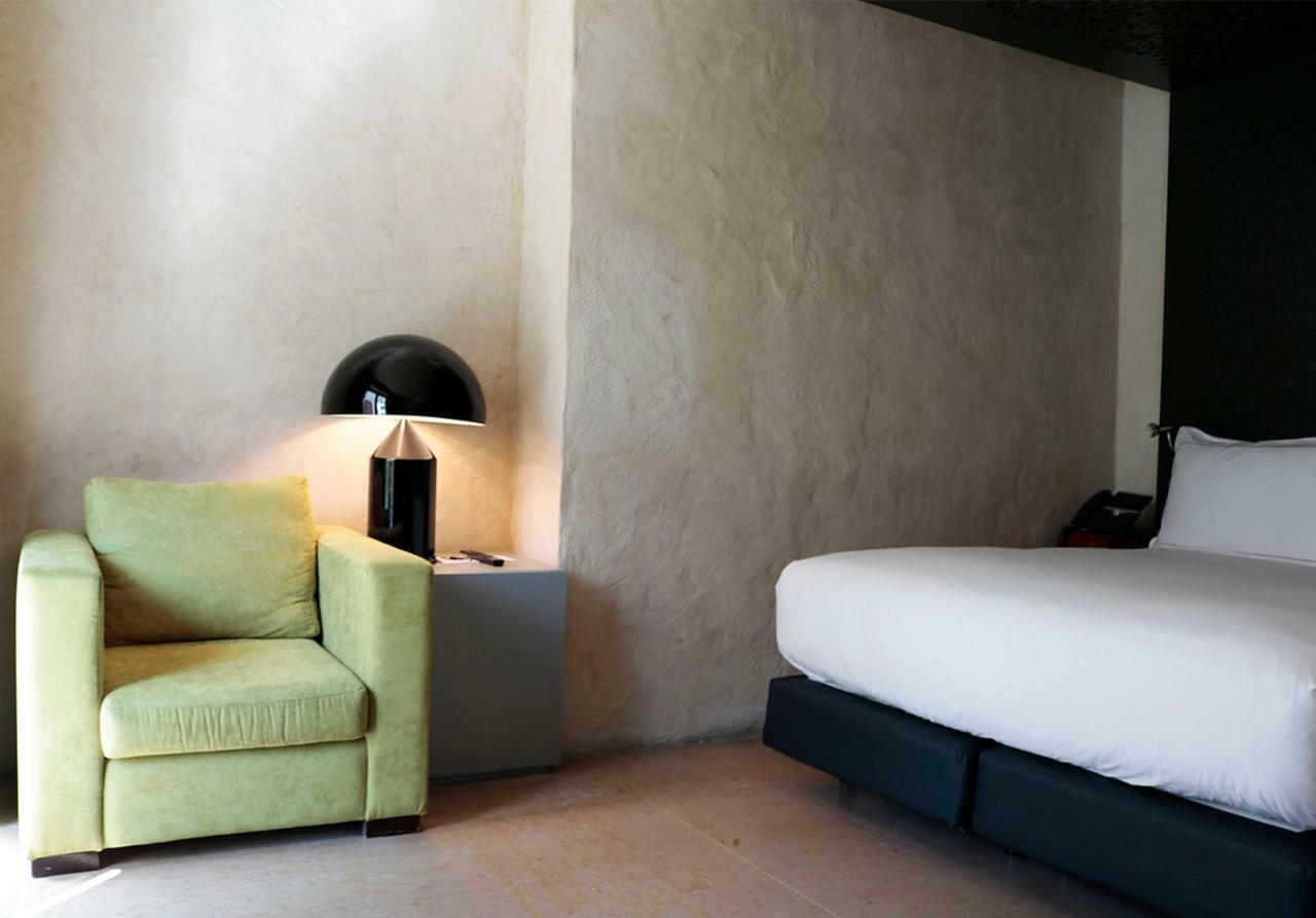 סביליה Eme Catedral Mercer Hotel מראה חיצוני תמונה A room at the hotel