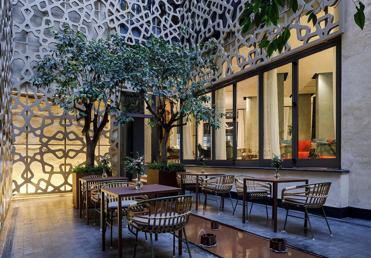 סביליה Eme Catedral Mercer Hotel מראה חיצוני תמונה The courtyard of the hotel