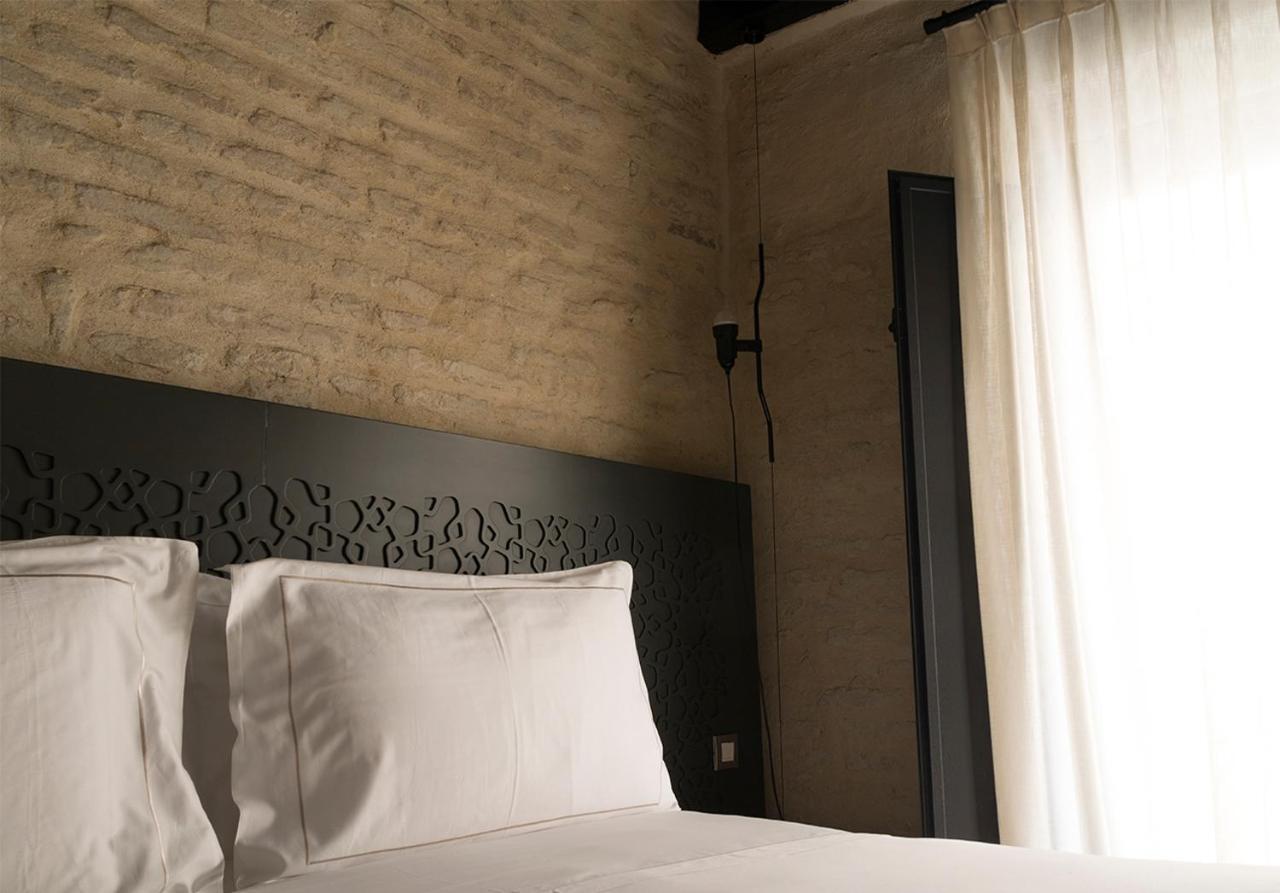 סביליה Eme Catedral Mercer Hotel מראה חיצוני תמונה A bedroom at the hotel